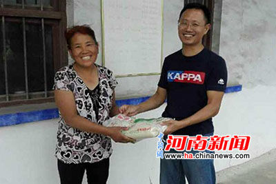 辉县市供电公司赴帮扶村为残疾人办理残疾证